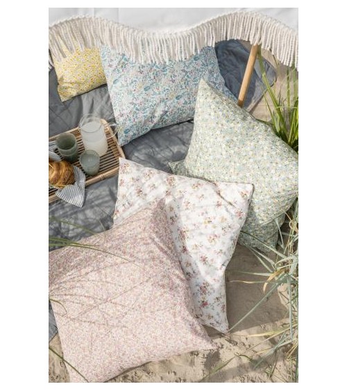 Housse de coussin bleu clair avec fleurs et feuilles