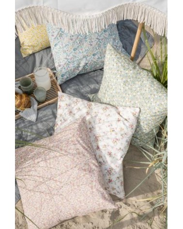 Housse de coussin bleu clair avec fleurs et feuilles